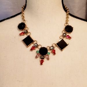 Gold tone with multicolored jewels statement neckl